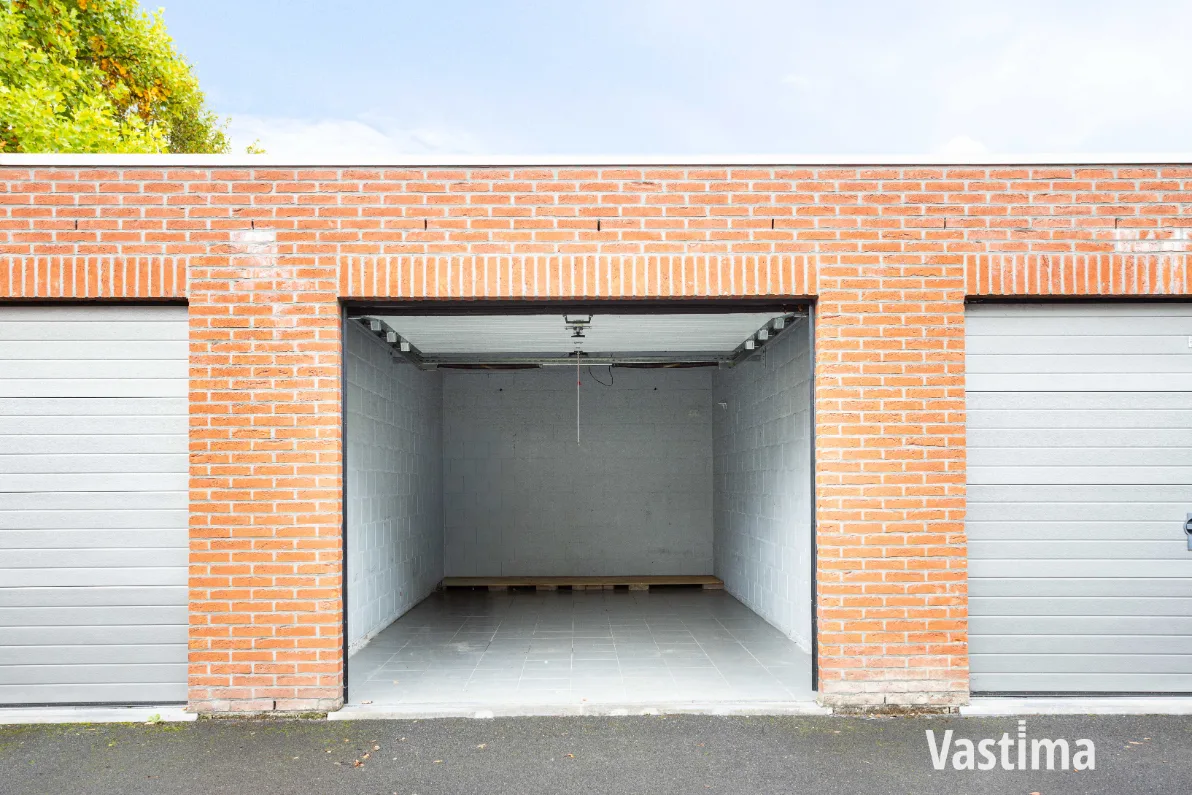 Immo Vastima - Appartement Te koop Aalst - Instapklaar 2-slaapkamerappartement met zuidgericht terras én garage