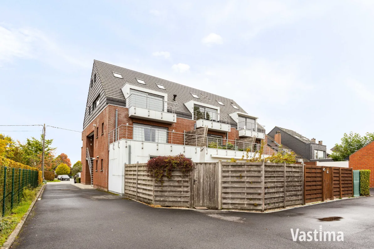Immo Vastima - Appartement Te koop Aalst - Instapklaar 2-slaapkamerappartement met zuidgericht terras én garage